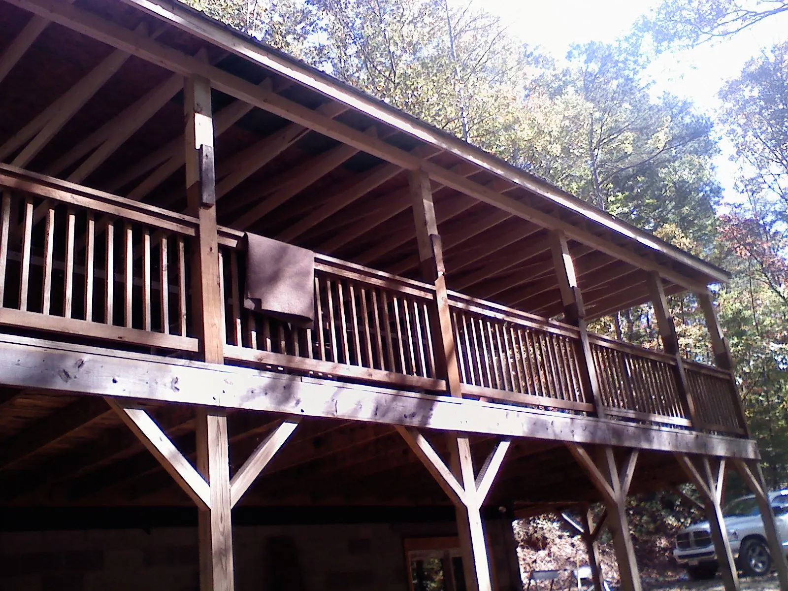 Timber framing under a new elevated porch and deck — Roof Leak Repair in Essex Fells by Roofing Brothers